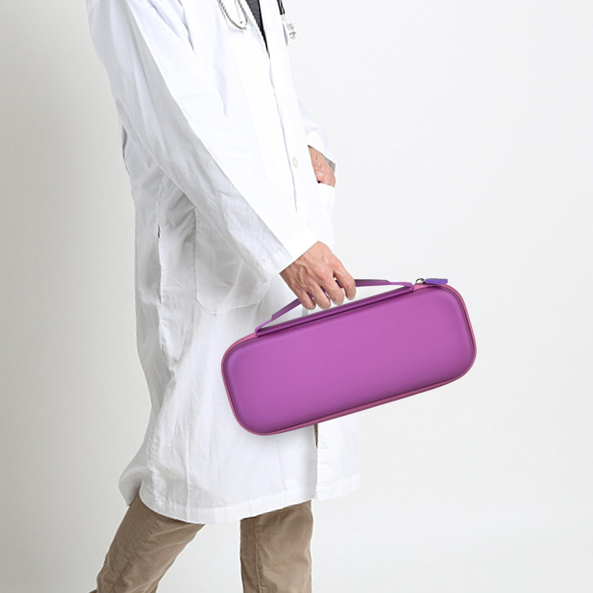 Healthcare professional carrying a closed purple hard stethoscope case