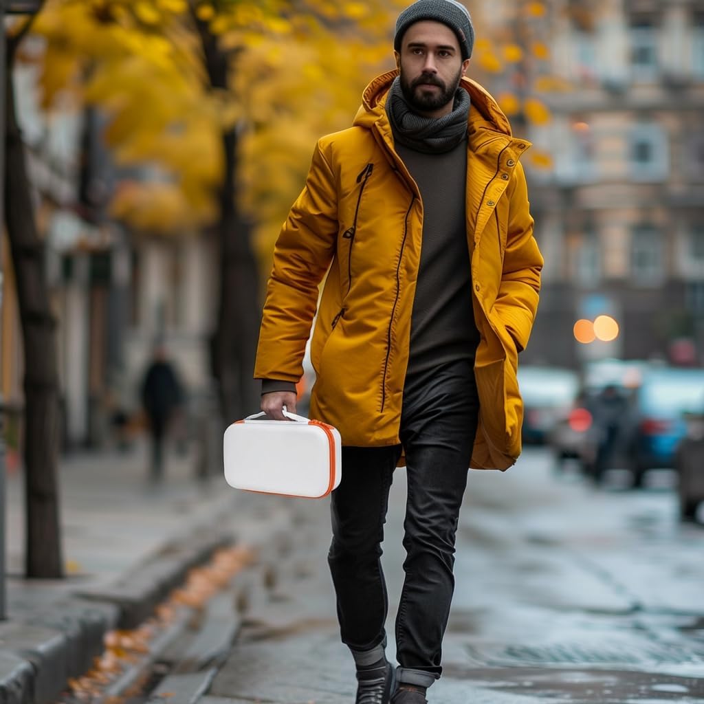Man carrying the white and orange microphone case while walking