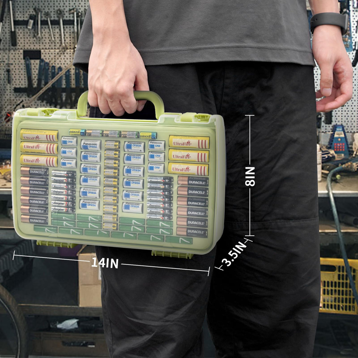 Lime green 269-slot battery organizer case carried by the handle with case dimensions shown