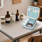 Open light blue for NIIMBOT label maker organizer beside bottles and jars