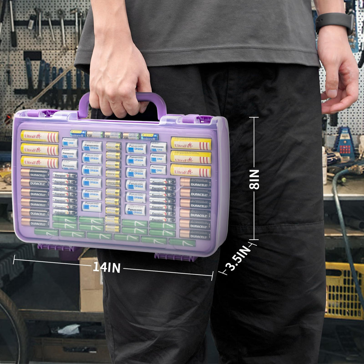 Purple 269-slot battery organizer case carried by the handle with case dimensions shown
