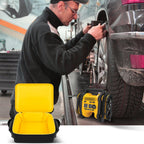 Open yellow-lined air compressor bag beside a for DEWALT tire inflator during tire maintenance