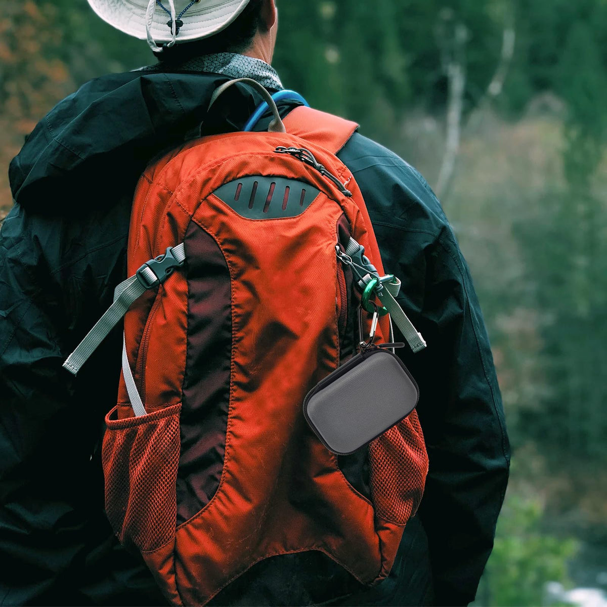 Gray for Crucial SSD case clipped to a hiking backpack