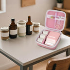 Open pink for NIIMBOT label maker organizer beside bottles and jars