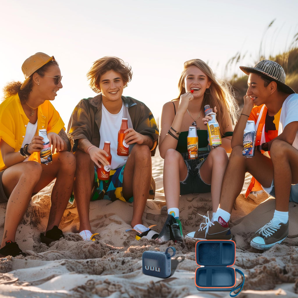 Friends using a for JBL Go speaker with the open blue and orange travel case at the beach