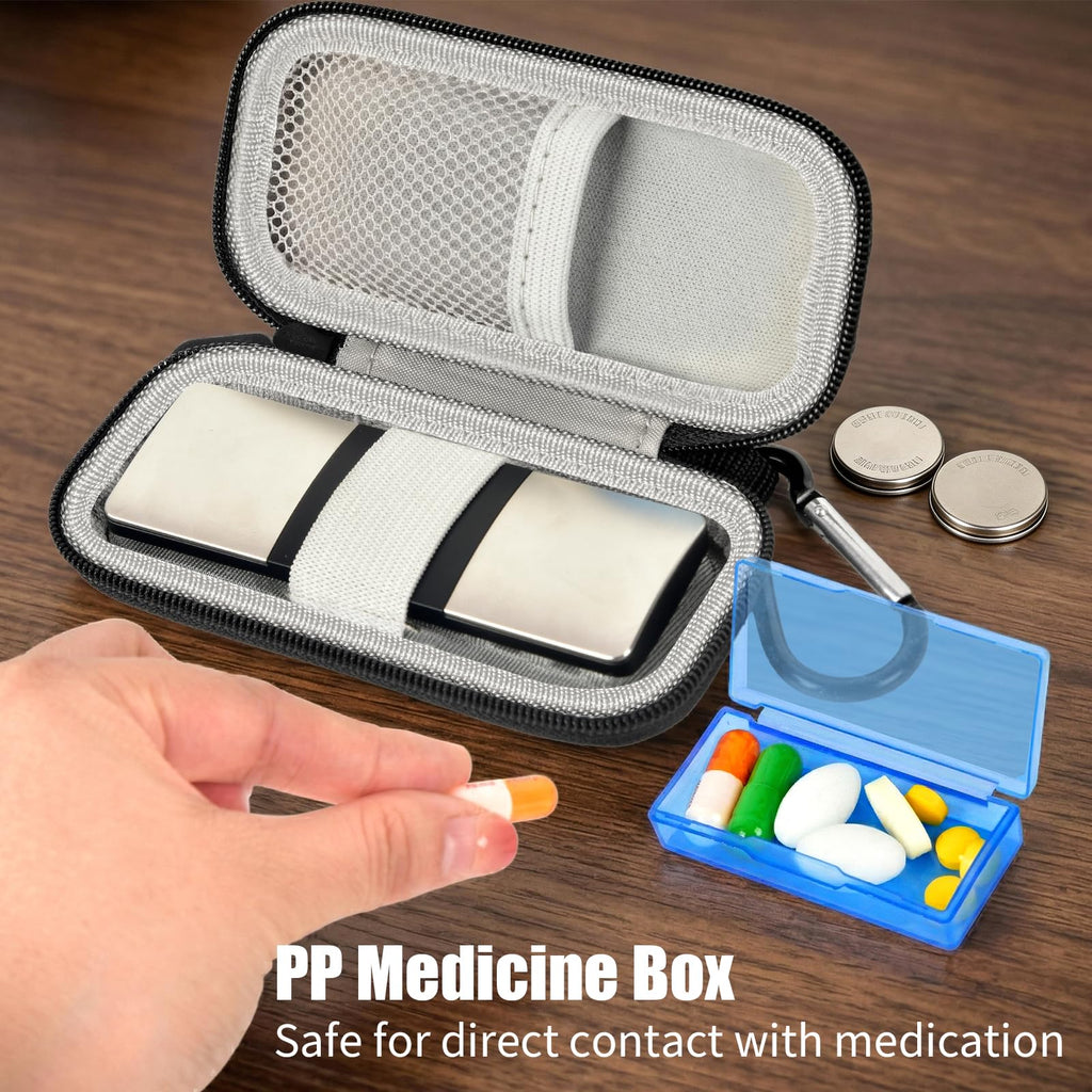 Open black organizer storing a for KardiaMobile device, medicine box, and small accessories